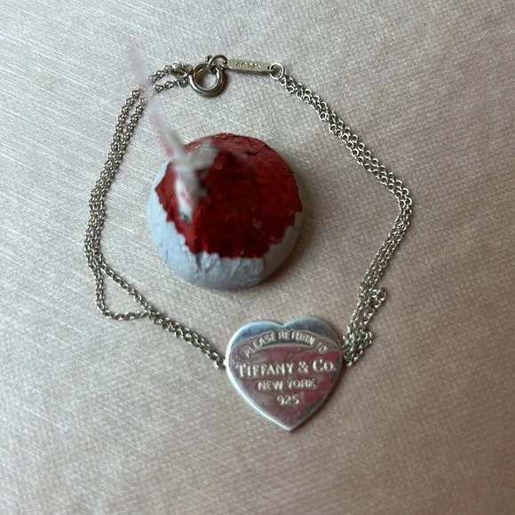 Tiffany baby bracelet with heart charm 99